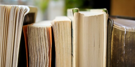 Books stacked together on their back