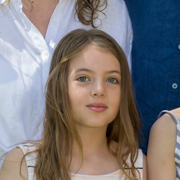 Edie outside with her family