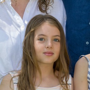 Edie outside with her family