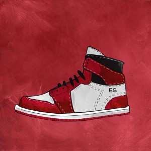 A red, black and white basketball shoe