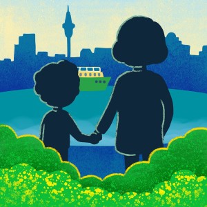 Two people stand looking at the bay with a ferry and the city in the background